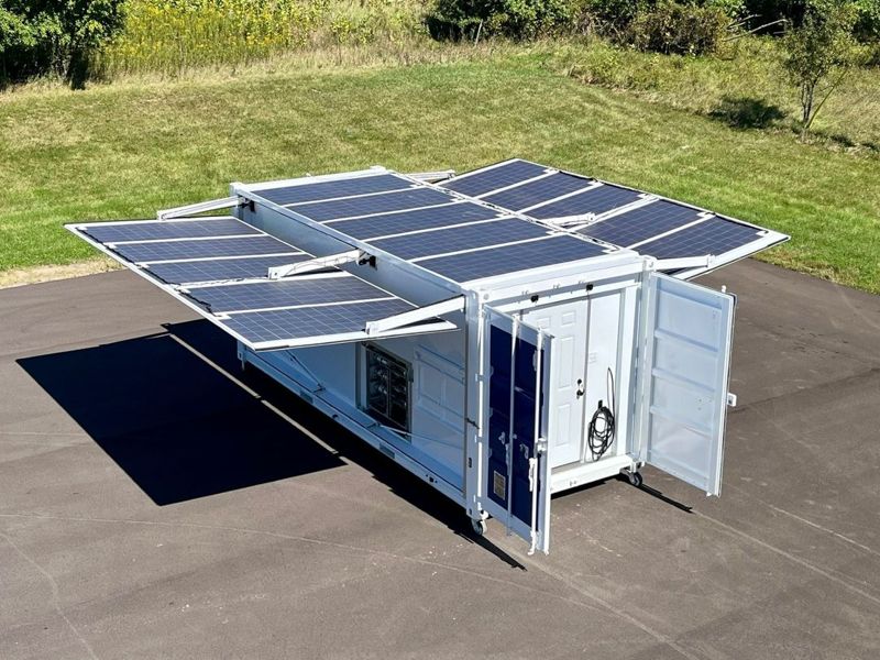 Mobile nanogrid trailer with fold-out solar panels